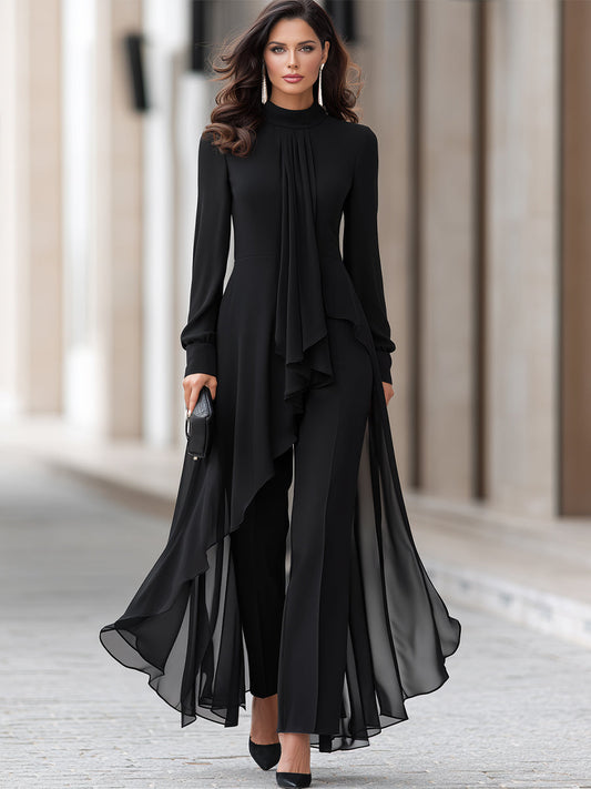 Full-length front view of a model walking in the black high-neck chiffon tunic set with heels 2