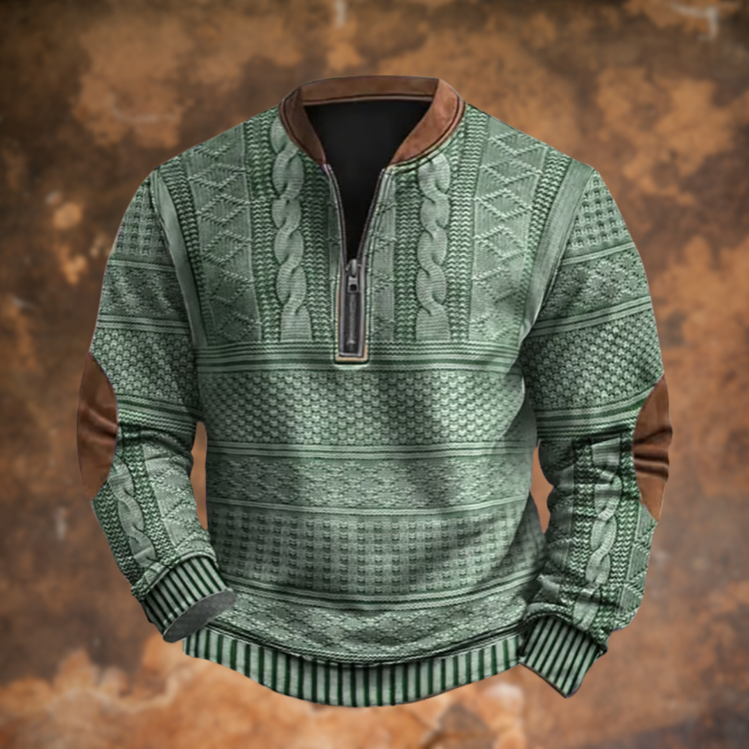 Front view in sage green with cable knit chest panels, striped ribbed cuffs and hem, tan collar and brown elbow patches. 6