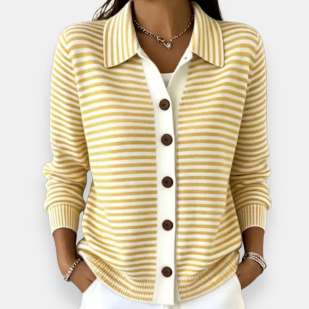 Model wearing the collared cardigan in yellow and white stripes, with a white button placket, brown buttons and ribbed cuffs. 6