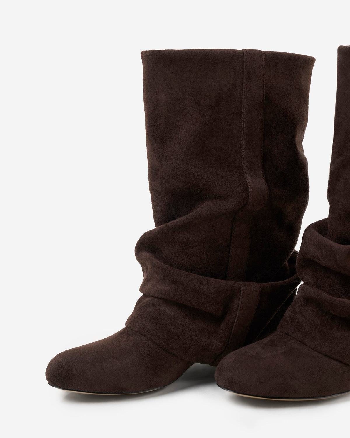 Angled close-up of the pair showing the rounded toe, gathered ankle folds and stitched strap detail on the shaft. 6