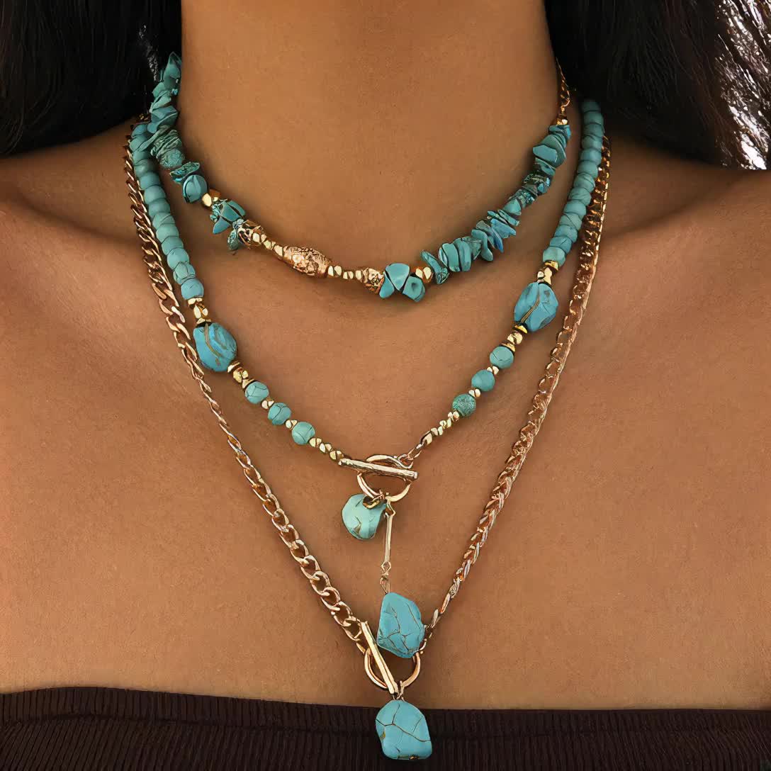 Another close-up of the layered necklaces on a model, showing the stone chips and hanging nugget pendants 8