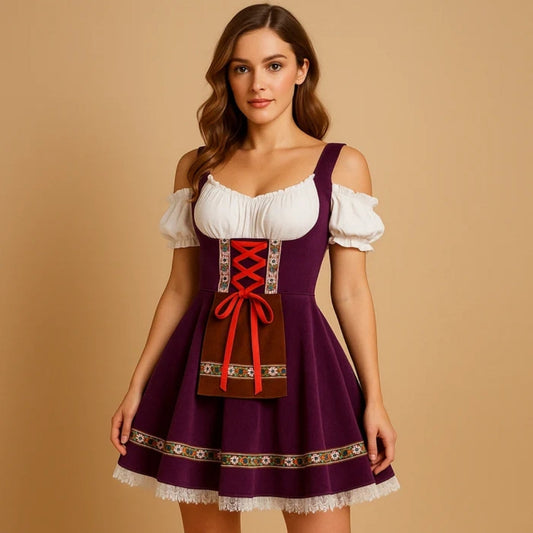 Model wearing a purple off-shoulder dirndl with red lacing, brown pocket apron, floral trim and white lace hem 2