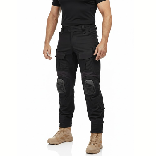 Man in a black t-shirt and sand boots wearing the black trousers, front three-quarter view 2
