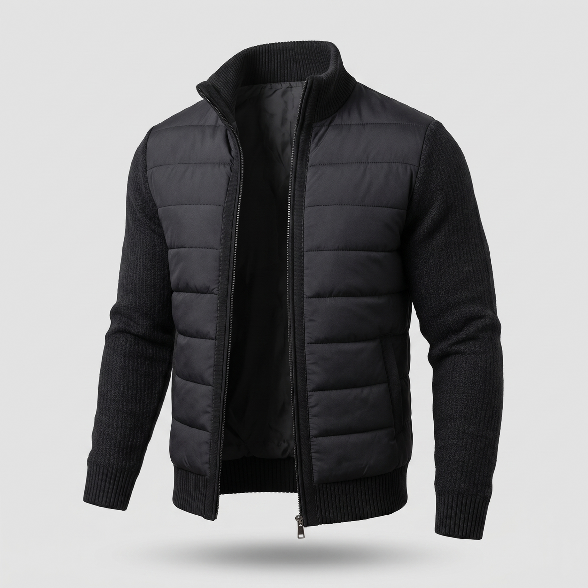 Black jacket at a three-quarter angle, unzipped, showing quilted body, ribbed knit sleeves and stand collar 6