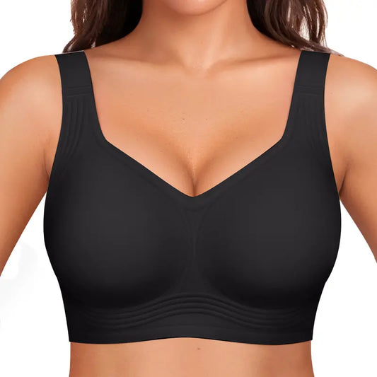 Black seamless bra with wide straps and ribbed lines along the band, worn by a model 2
