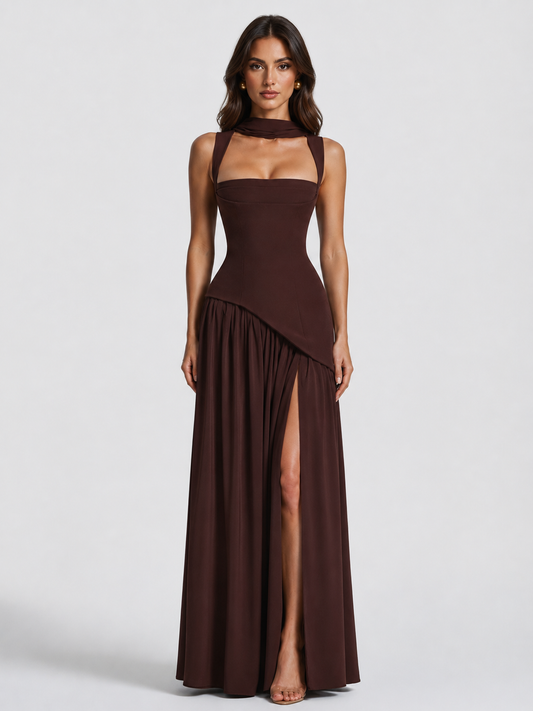 Front view in dark chocolate brown on a model, showing the square-neck corset bodice, neck scarf, asymmetric gathered skirt and high thigh slit. 1