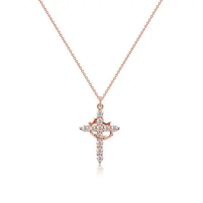 Rose gold-toned cross necklace with sparkling stones and a crown at the centre, shown flat on white 7
