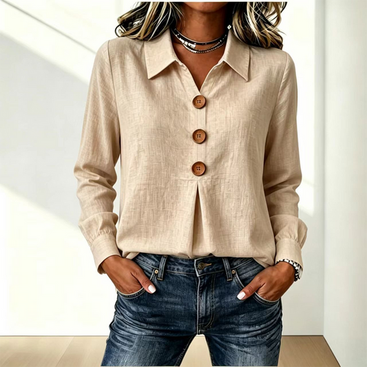 Beige version of the shirt worn with jeans, showing three buttons and a pleat 2