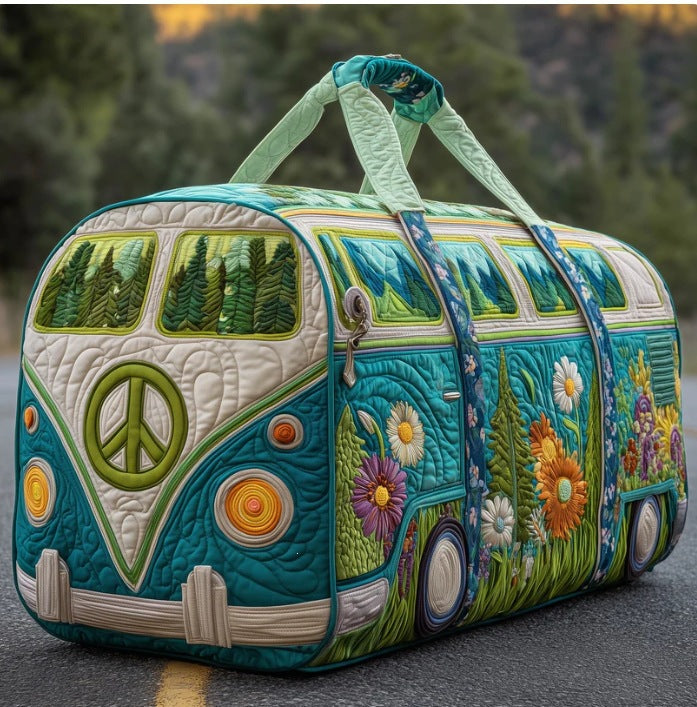 Teal quilted duffle shaped like a camper van, with peace sign, flowers and pale green handles, on a road 1