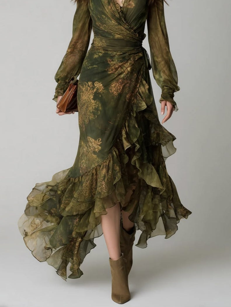 Close-up of the lower half showing the wrap skirt with layered, flowing ruffles along the asymmetric hem and olive suede ankle boots. 4