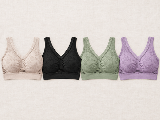Four bras in a row, in beige, black, sage green and lilac, showing the colour options 2