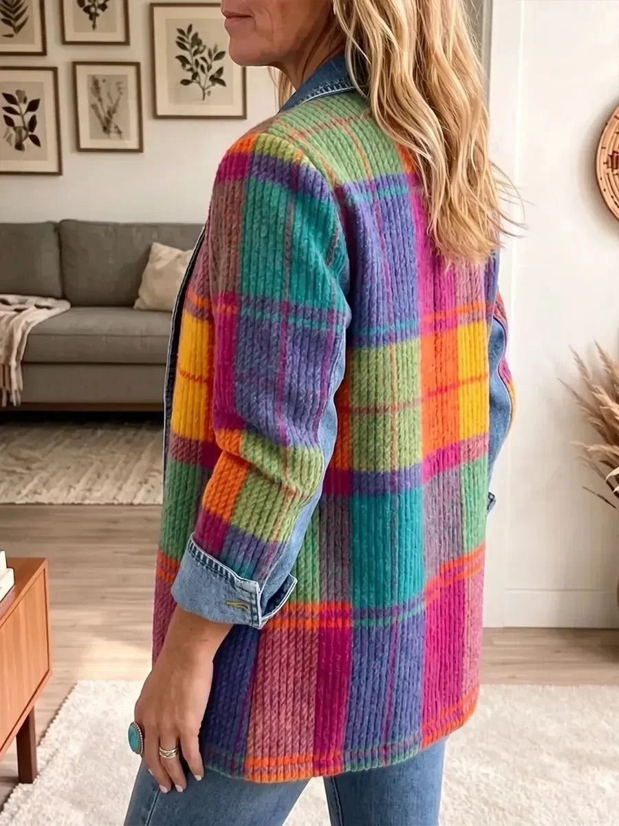 Side and back view of the multicoloured plaid jacket on a model, showing the textured checked pattern and rolled denim cuff. 2