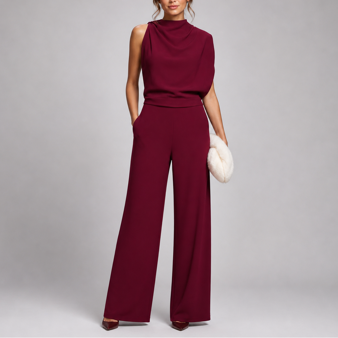 Model wears the jumpsuit in deep burgundy with a cowl-style draped top and matching heels, holding a fluffy clutch 7