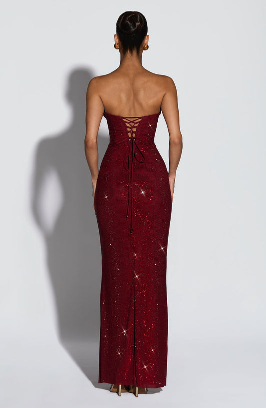 Back view of the burgundy dress showing the lace-up corset back with trailing ties 2