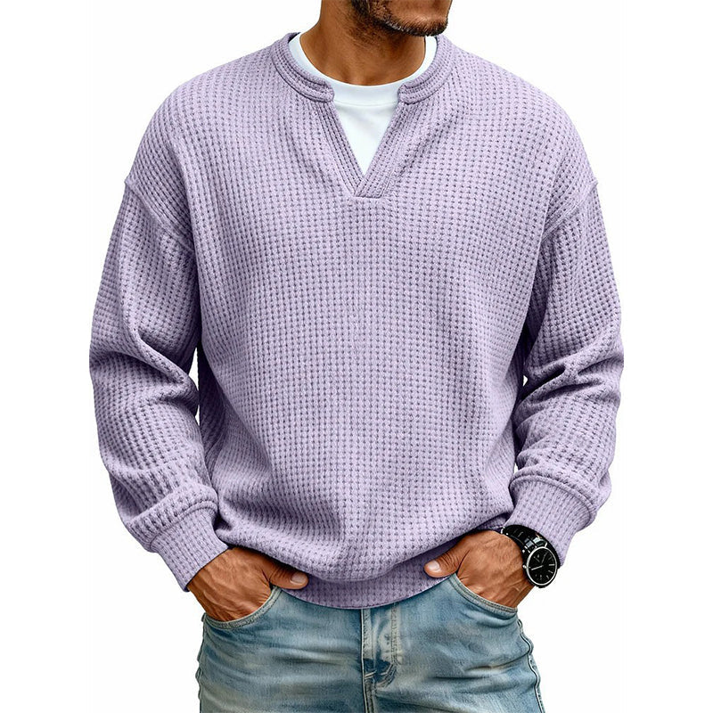 Front view of the waffle knit top in lilac over a white tee, hands in pockets 19