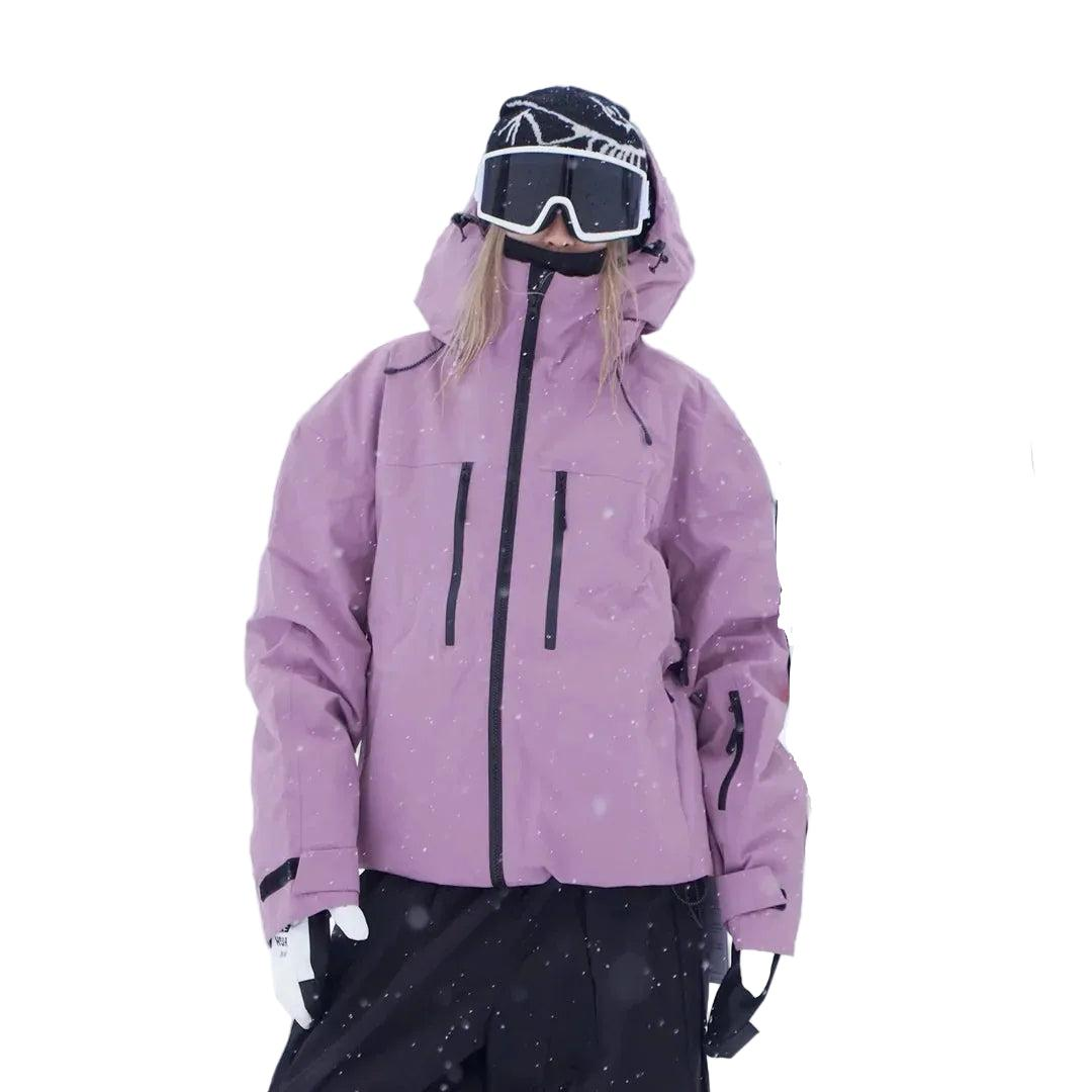 Front view of the lilac jacket worn by a model, showing the two chest zip pockets 4