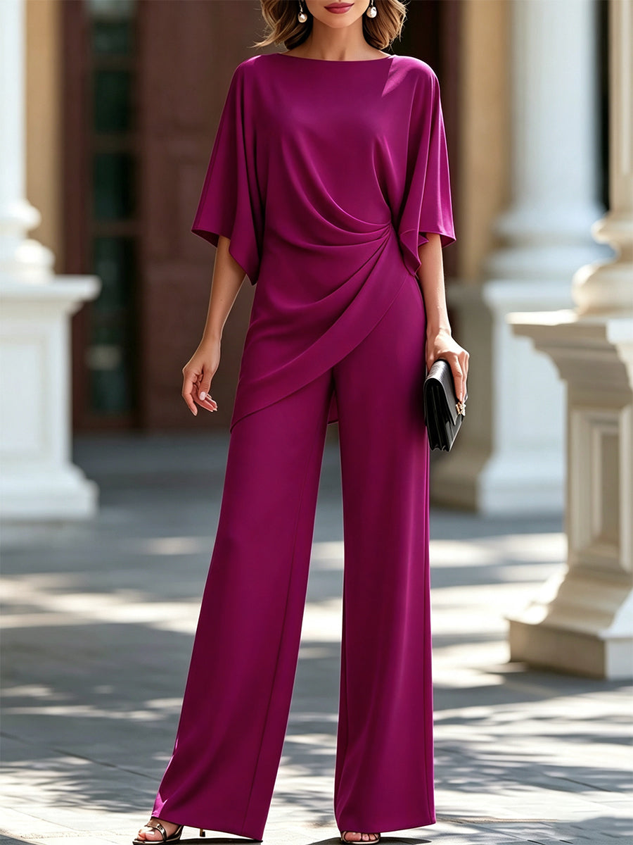 Model wearing the bold magenta-purple version, front view, showing the gathered waist drape, wide sleeves and wide-leg trousers. 4
