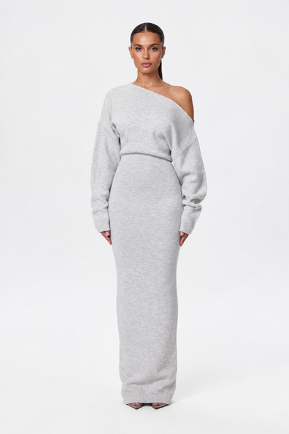 Model facing the camera in the light grey marl off-the-shoulder knit maxi dress with long sleeves. 9