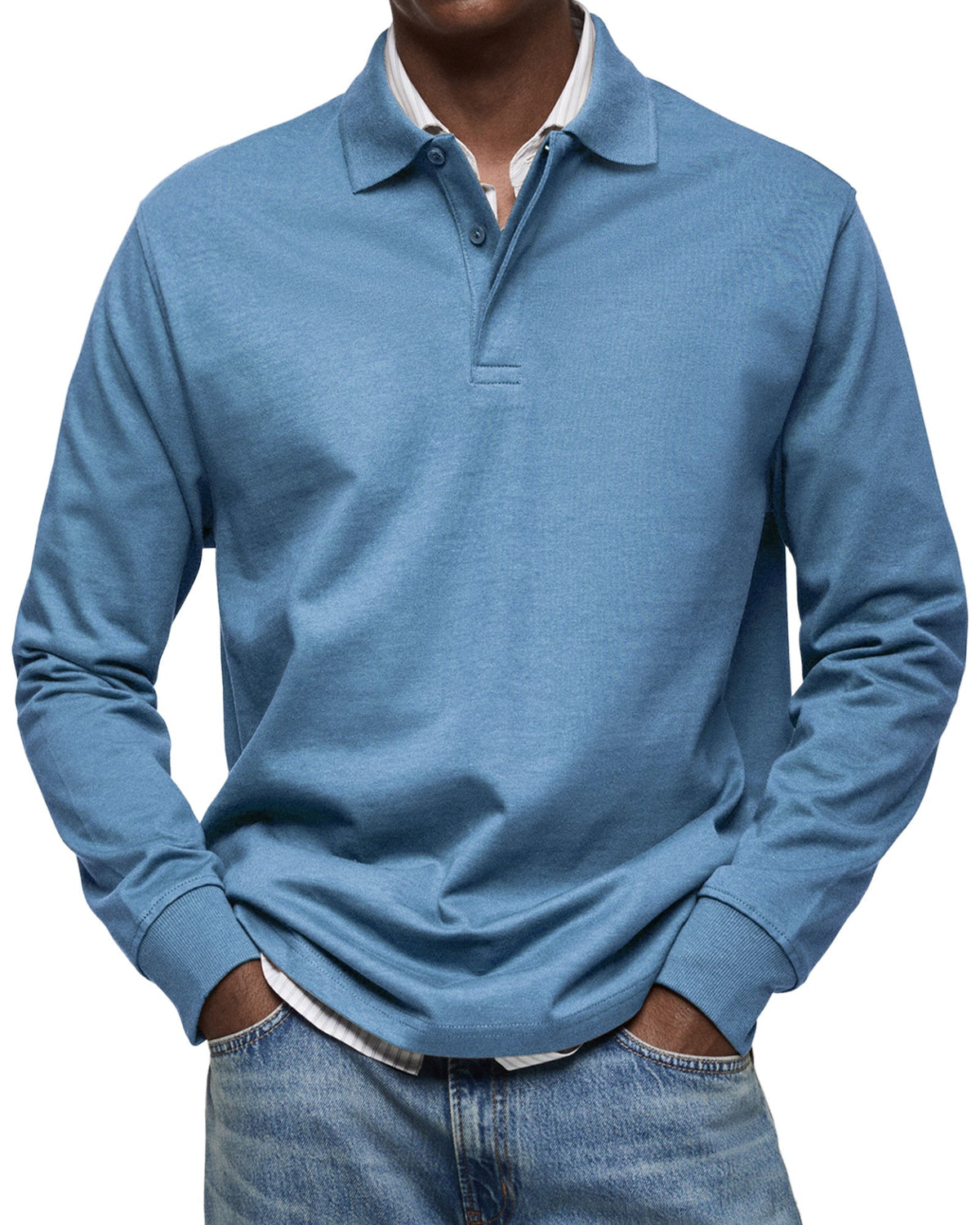 Light blue version worn by a model, hands in jeans pockets, striped shirt underneath 2