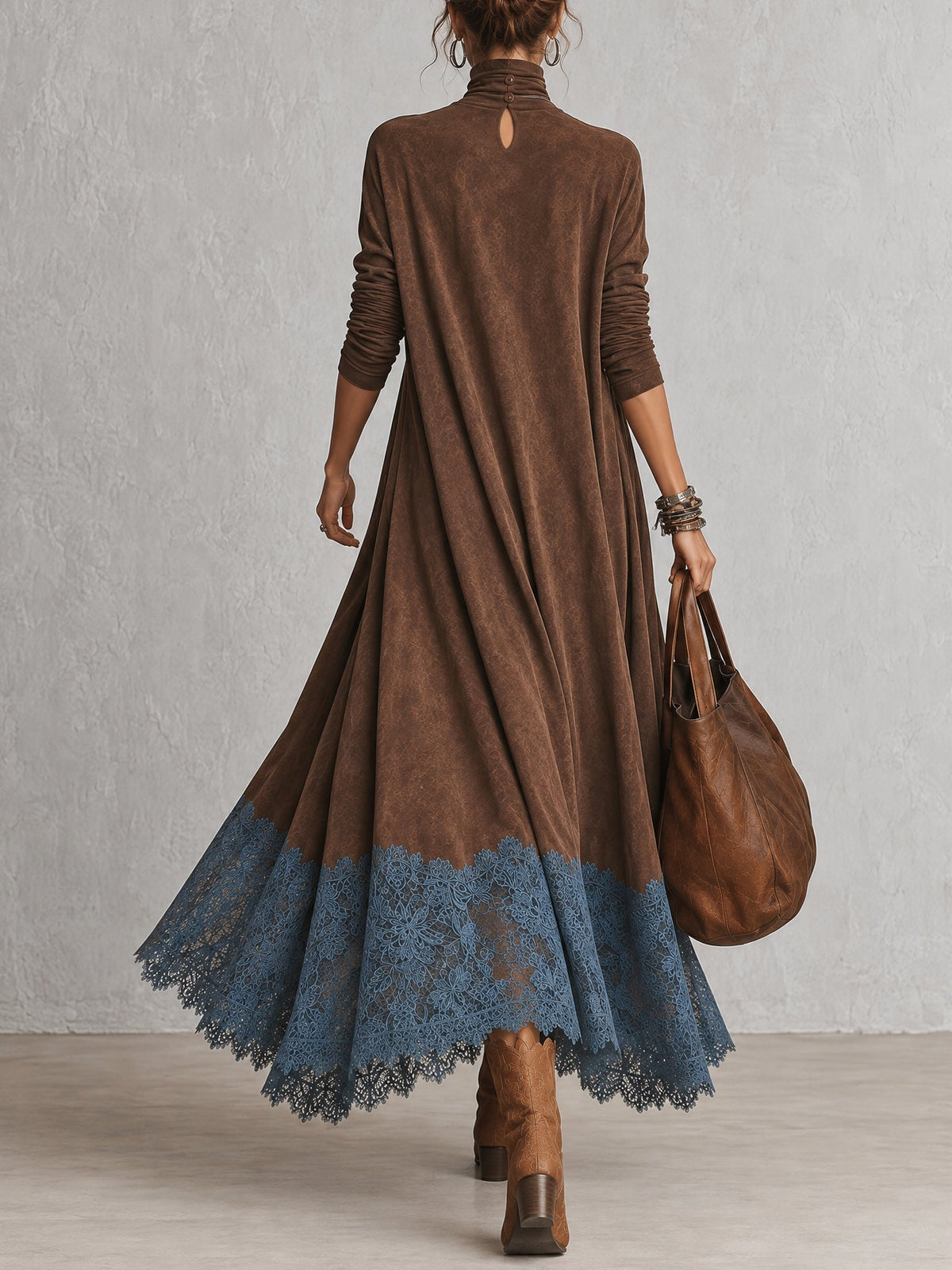 Back view of the brown dress showing the high collar with buttons, keyhole opening and lace hem 10