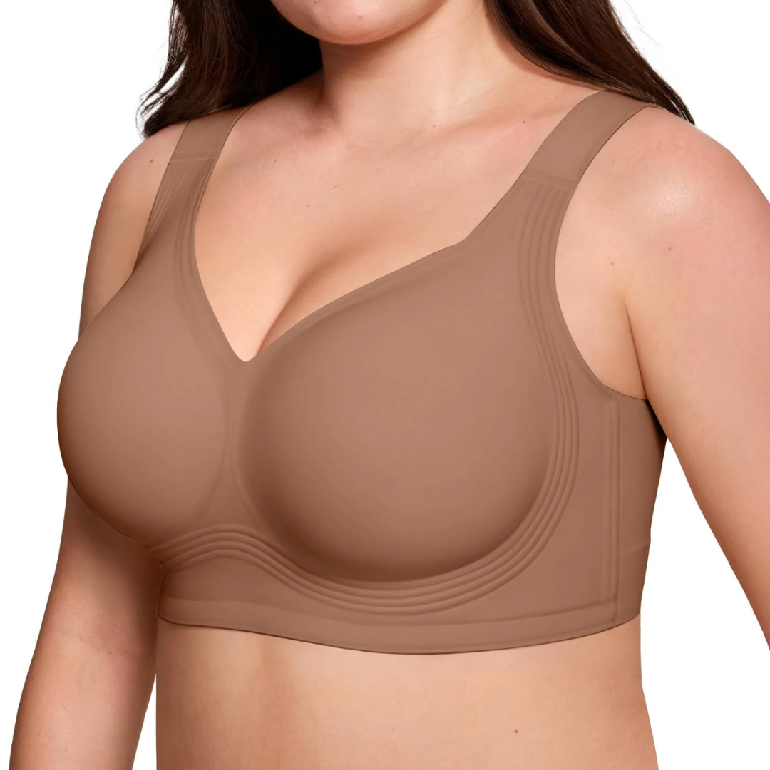 Three-quarter view of the brown wireless bra on a model, showing the V-neckline and wavy lower band 7