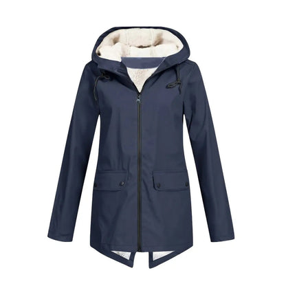 Flat front view of the jacket in navy blue, showing the cream fleece-lined hood, centre zip and two buttoned flap pockets. 6