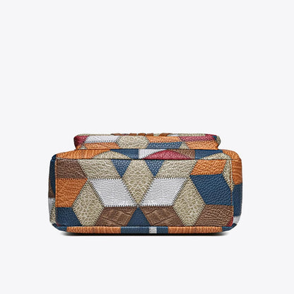 Underside of the bag, showing the base covered in hexagonal patchwork pieces. 12
