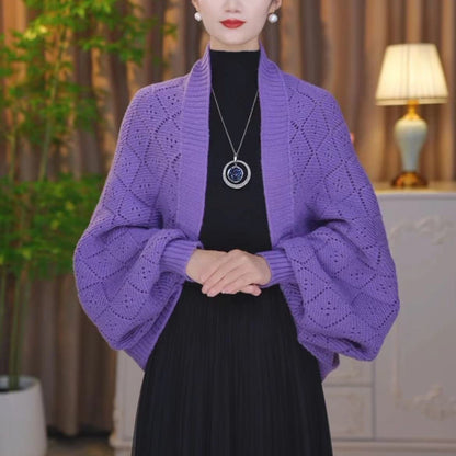 Model wearing the open knit shawl cardigan in purple, with voluminous sleeves and diamond-shaped openwork 8