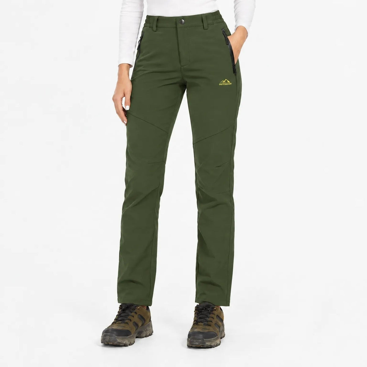 Front view of the trousers in dark olive green, worn with hiking boots 7