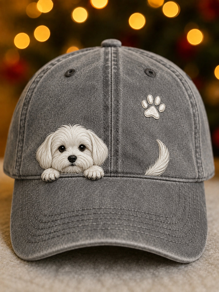 Front view of the grey washed cap with a peeking white puppy, paw print and tail 4