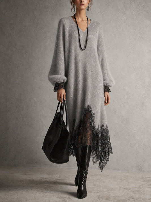 Model in the grey sparkly knit dress with black lace hem, carrying a black tote and wearing knee-high boots 1