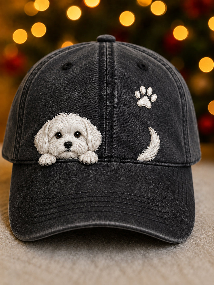 Front view of the black faded cap with a peeking white puppy, paw print and tail 3