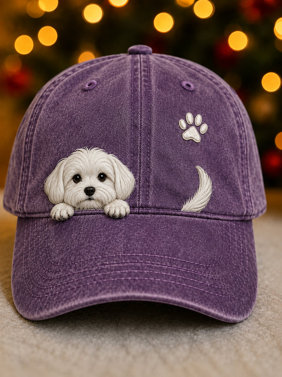 Front view of the purple washed cap with a peeking white puppy, paw print and tail 7