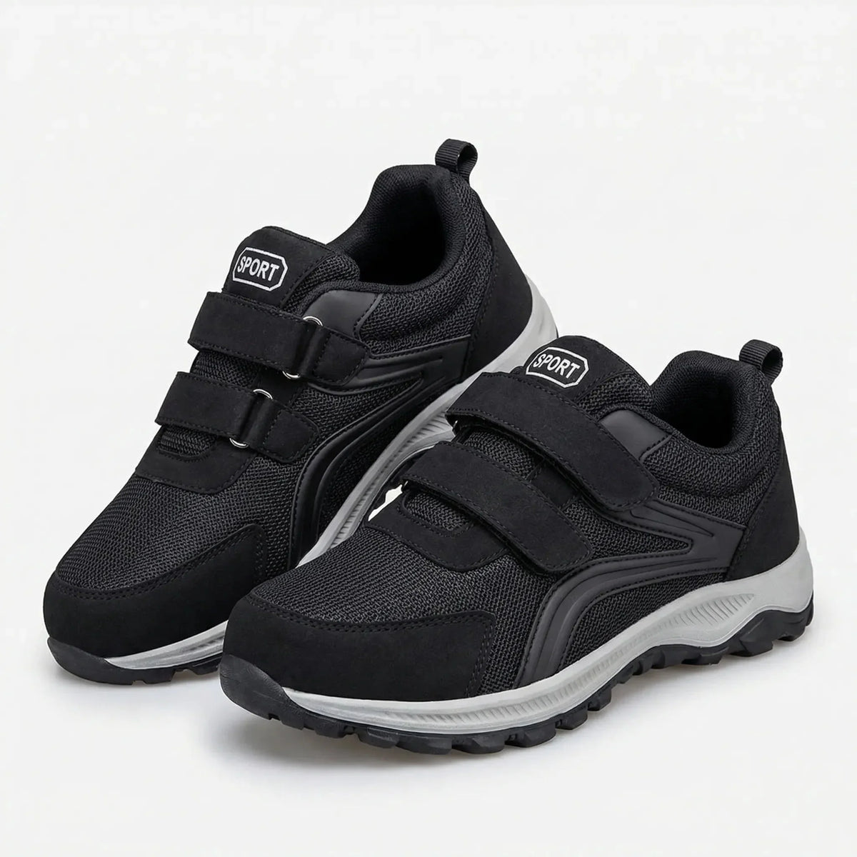 Pair of black shoes with grey soles and double straps, shown at an angle on white 5
