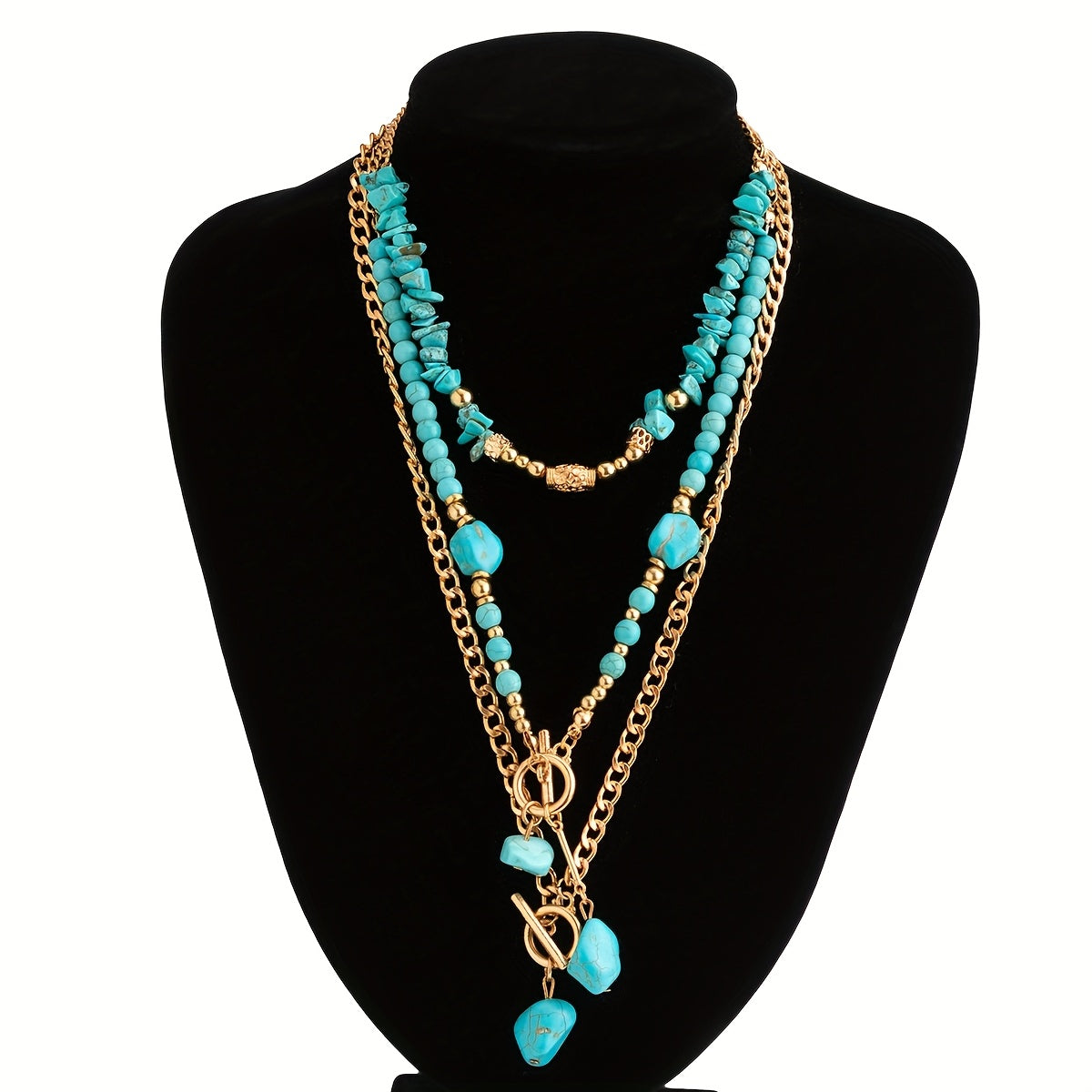 All three necklaces displayed together on a black velvet bust, showing their different lengths and toggle pendants 3