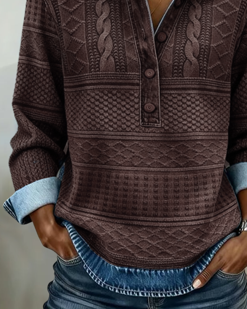 Close-up of the brown sweatshirt's front and hem, showing horizontal textured bands and the denim-effect lining peeking out below. 5