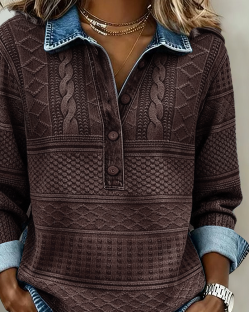 Close-up of the dark brown sweater's denim collar, button placket and rolled blue cuff 9