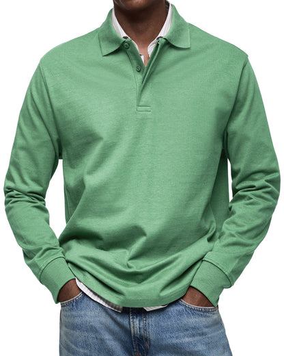 Green version worn by a model, layered over a striped shirt with light jeans 7