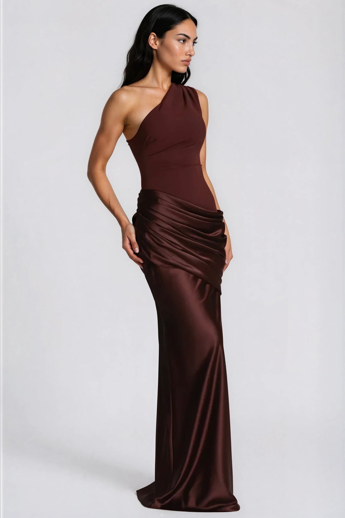 Brown satin gown seen from the side, showing the gathered drape at the hip and long skirt 8