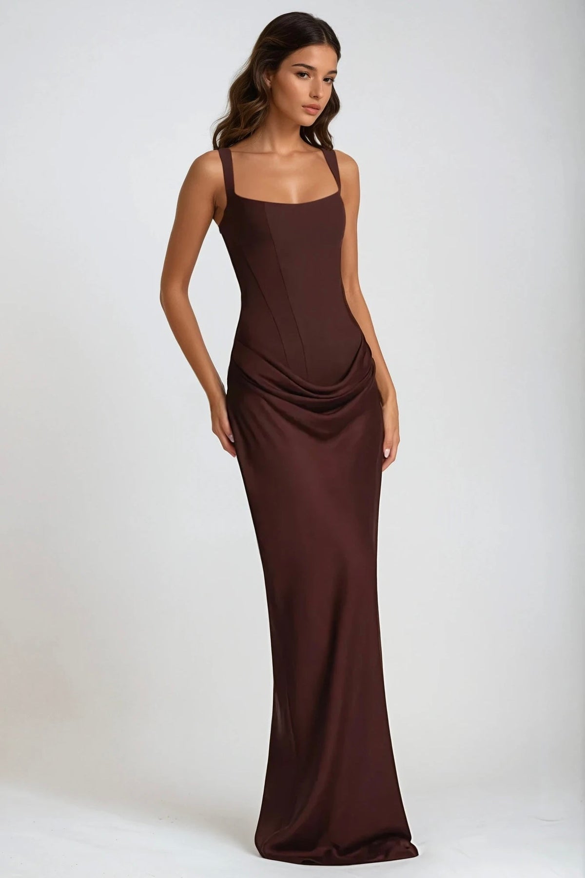 Brown maxi dress worn at an angle, showing the draped hip ruching and fitted corset bodice 6