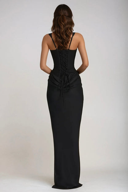 Back view of the black dress, showing the lace-up corset back, adjustable straps and gathered detail at the waist 27