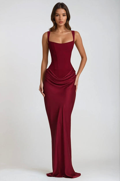 Front view of the burgundy maxi dress on a model, with square neckline and fitted skirt 24