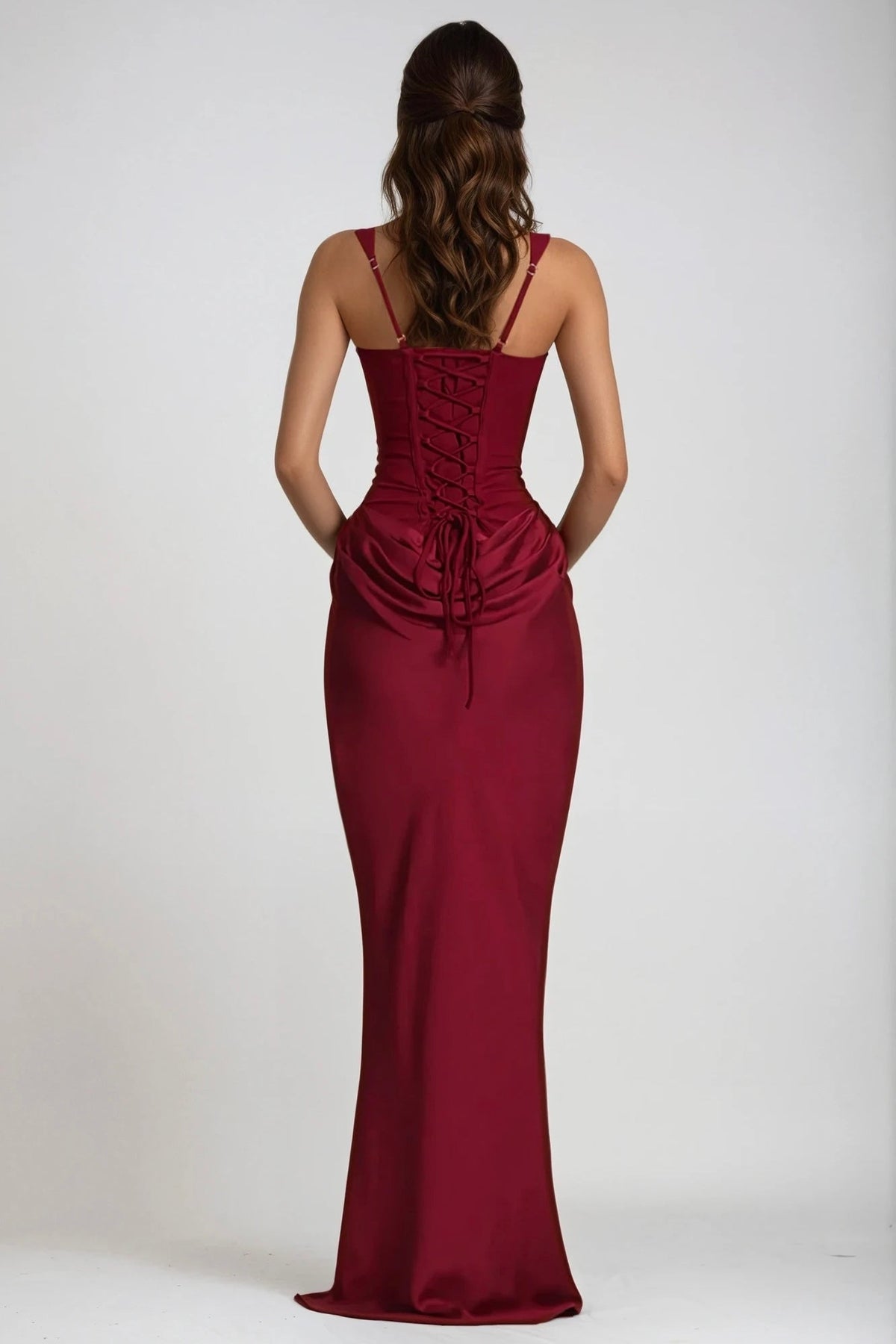 Back view of the burgundy dress, showing the lace-up corset back, adjustable straps and gathered drape below the waist 23