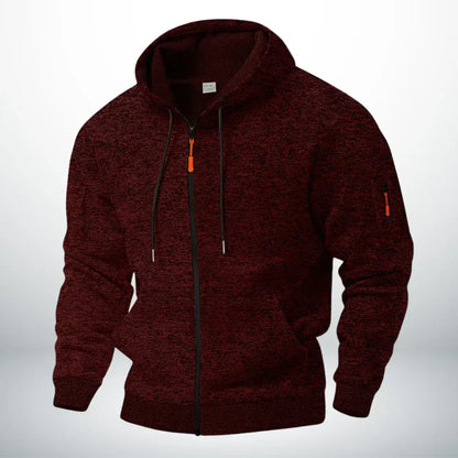 Front view of the hoodie in mottled dark red, showing the zipped sleeve pocket 2