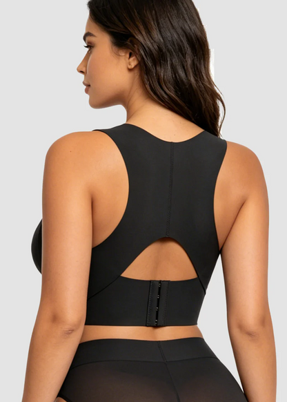 Back view of the black bra on a model, showing the racerback with keyhole cut-out and hooks 16