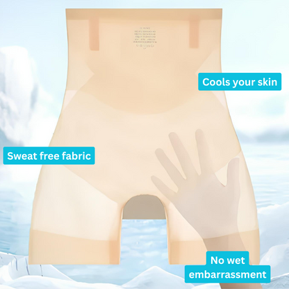 Beige high-waisted shorts laid flat on an icy background, with a hand pressed against the sheer fabric to show its thinness. 5