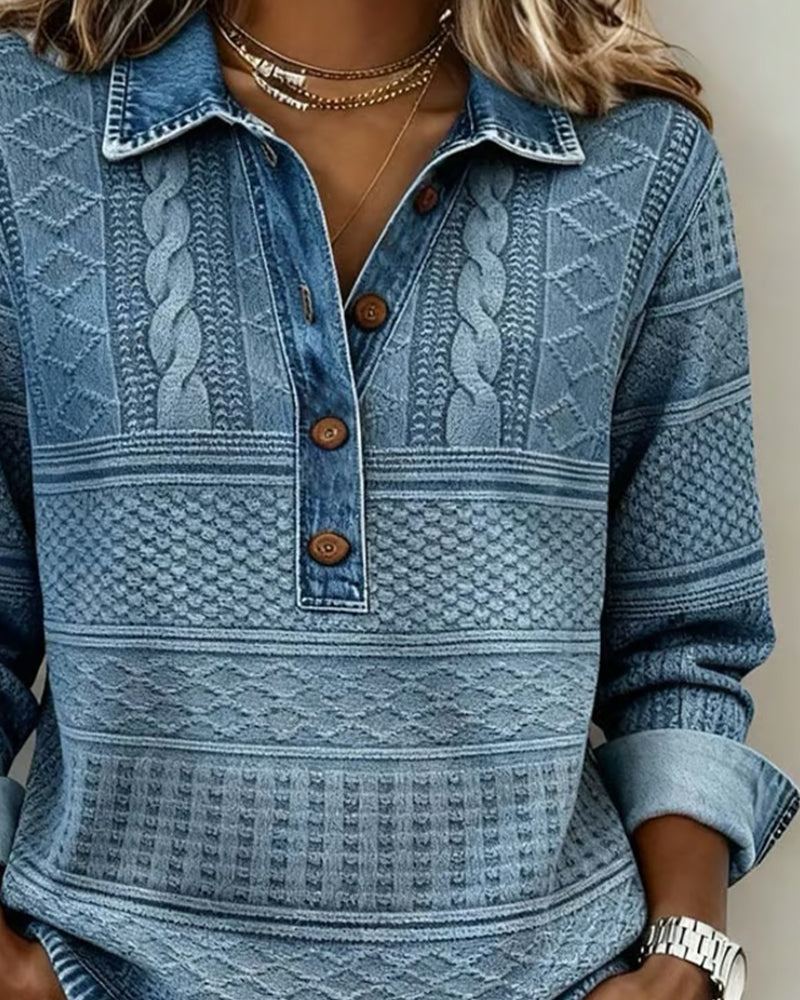 Close-up of the blue sweater's collar, button placket and layered gold necklaces on the model 3
