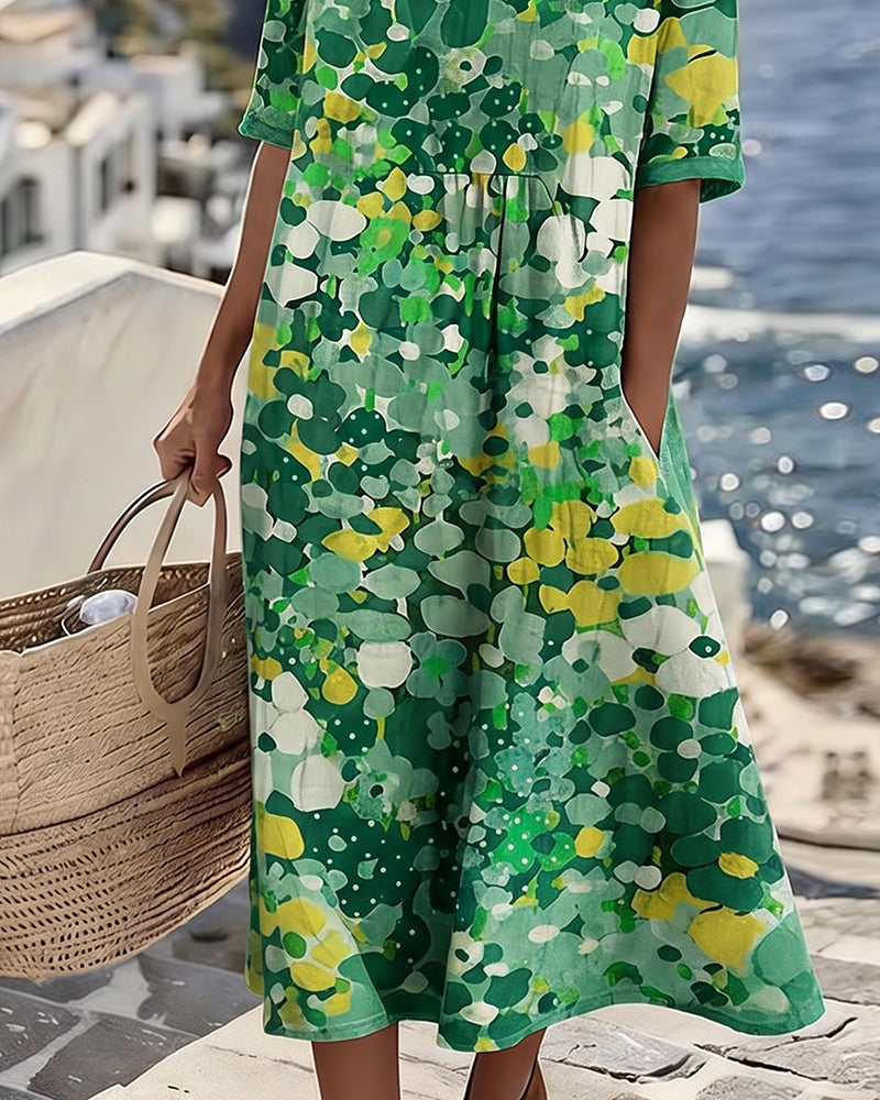 Detail of the green floral dress's gathered bodice, side pocket and swishy skirt 7
