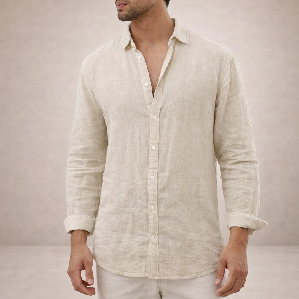 Natural beige linen shirt with pale buttons, shown from the chin down with sleeves rolled and cream trousers. 6