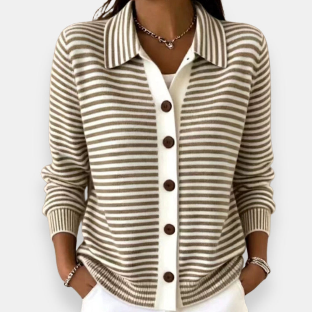 Model wearing the collared cardigan in taupe and white stripes, with a white button placket, brown buttons and ribbed cuffs. 1